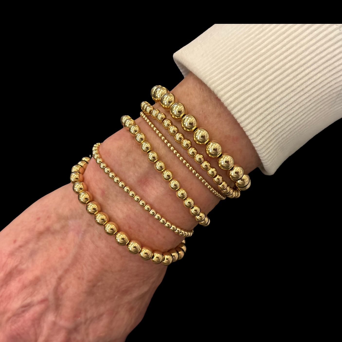 Love me bundle includes six bracelets. 2 mm, 3 mm, 4 mm, 5 mm, 6 mm and 7 mm stack